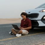 How to Power Laptops and AC Devices From Your Car on a Road Trip