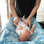 What Traveling With a Newborn Actually Requires (Beyond Diapers)