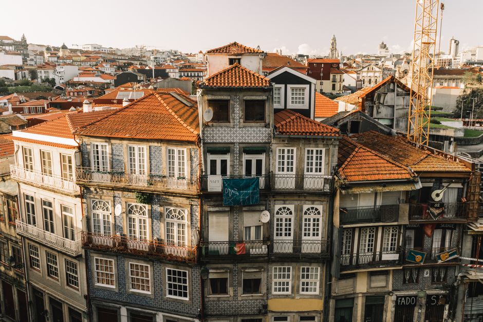 A beautiful aerial view of traditional architecture in Porto, Portugal with a scenic cityscape.